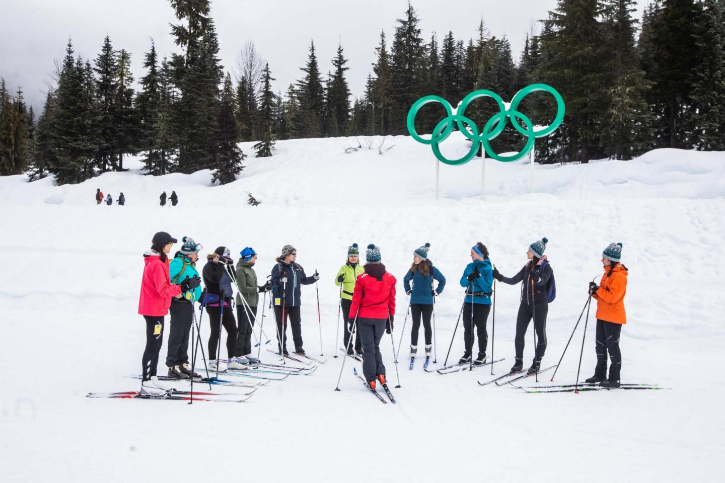 skiing camp in front of olympic rings