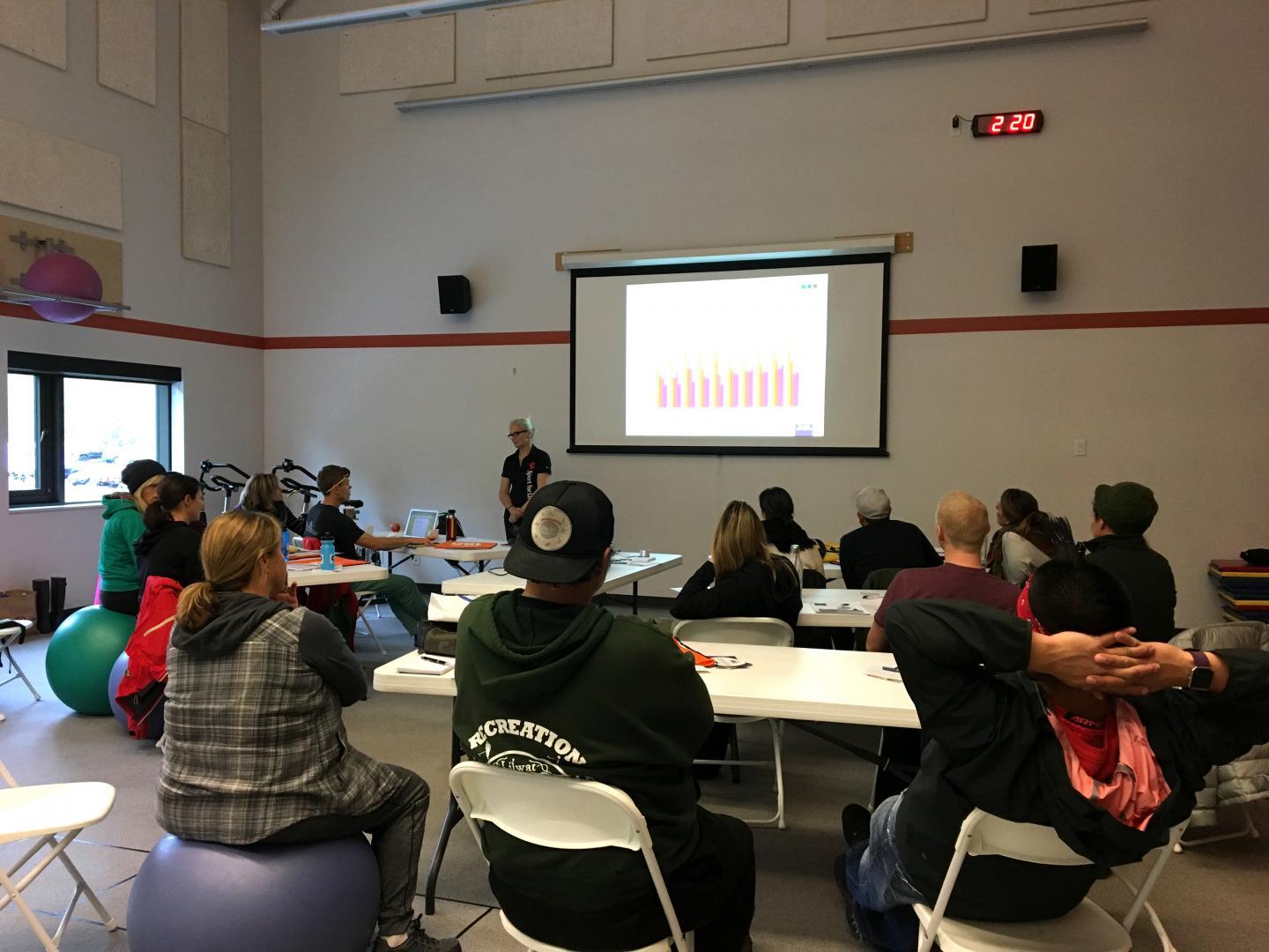 Group of people viewing a presentation