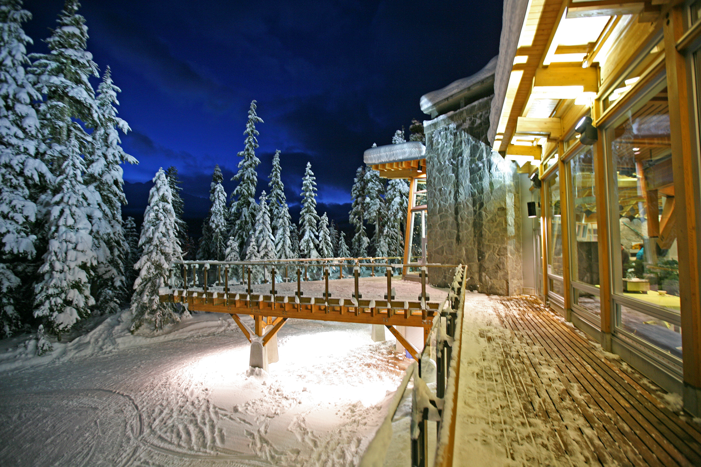 Day lodge back patio in winter at night